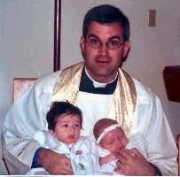 Fr. Sibley with Babies.jpg